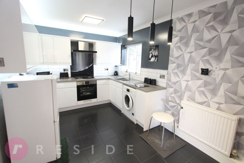 Property photo 3 of 13 Dining Kitchen