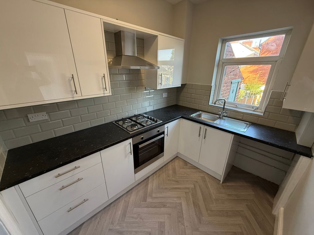 Property photo 3 of 13 Kitchen