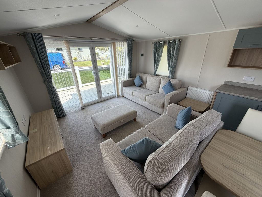 Property photo 3 of 8 Living Area With Patio Doors In The Willerby Malton Holiday Caravan At New Minerton Leisure Park, Pembrokeshire