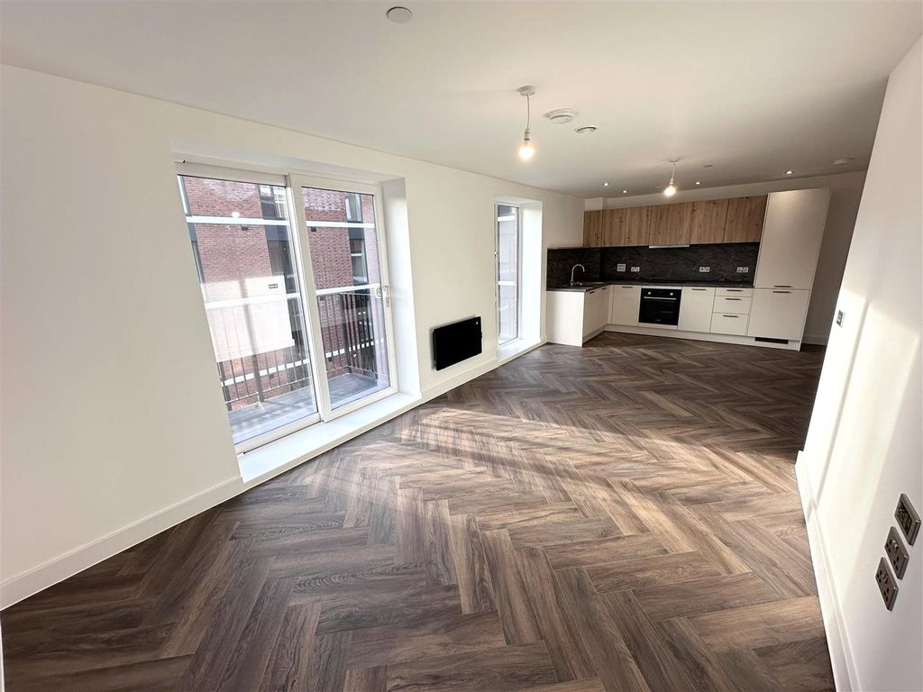 Property photo 1 of 11 Kitchen Living