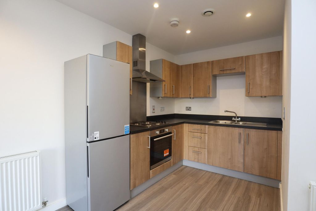 Property photo 3 of 12 Kitchen