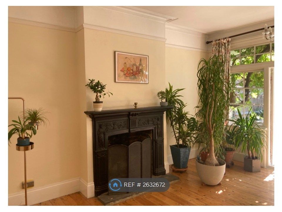 Property photo 3 of 15 Living Room - Open Fireplace