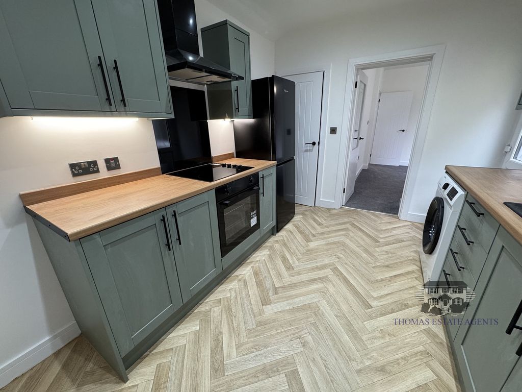 Property photo 2 of 13 Kitchen