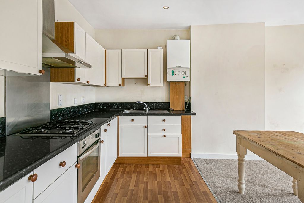 Property photo 3 of 12 Kitchen