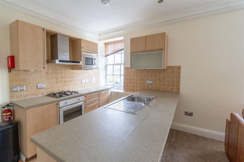 Property photo 3 of 7 Kitchen