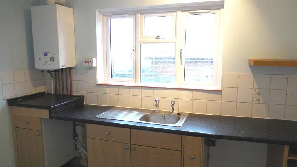 Property photo 3 of 7 Kitchen