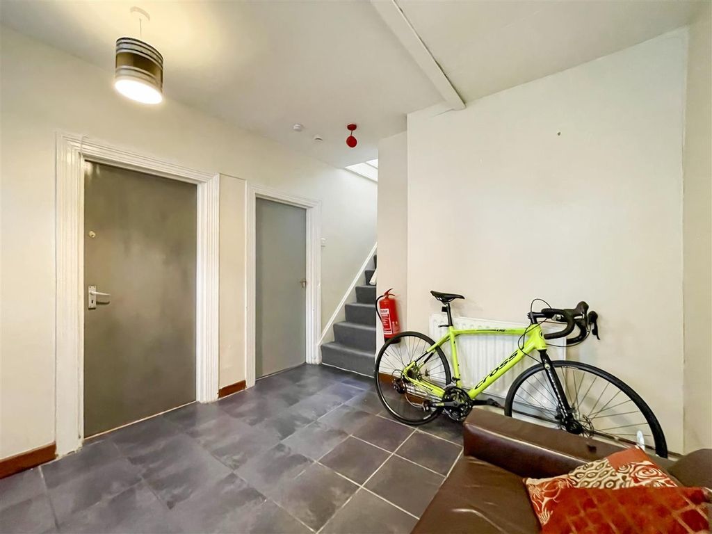 Property photo 3 of 21 Bright Entry Hall With Stylish Tiled Flooring...