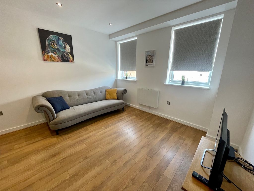 Property photo 3 of 6 Living Area