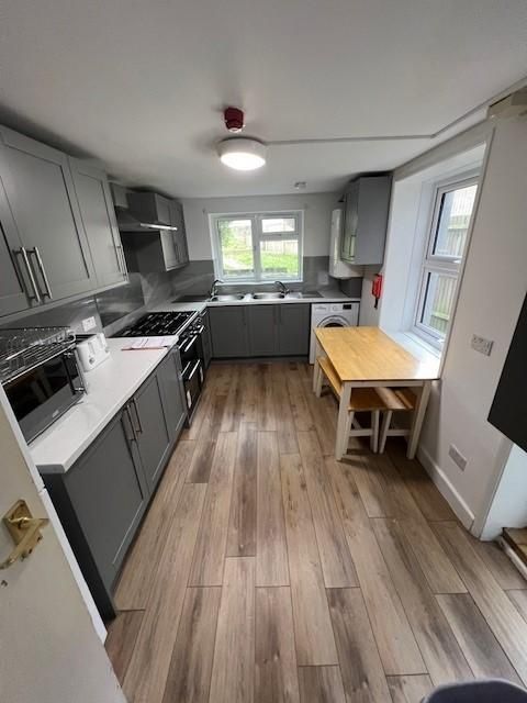 Property photo 1 of 25 Bright Modern Kitchen With Grey Fitted Cabinets, i...