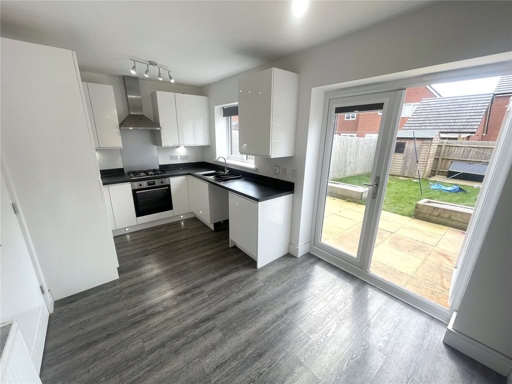 Property photo 3 of 16 Kitchen