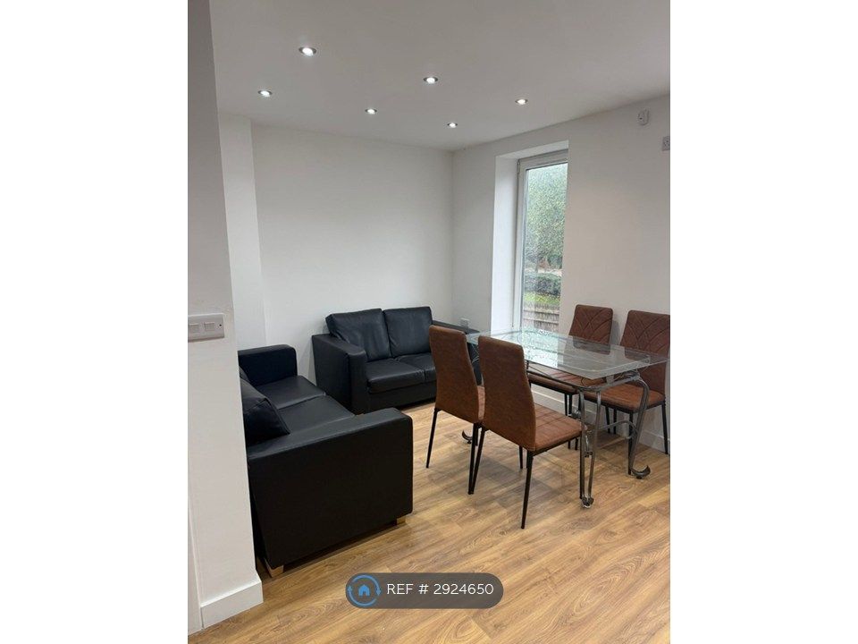 Property photo 3 of 12 Kitchen With Chillout Sofas And Dining Table