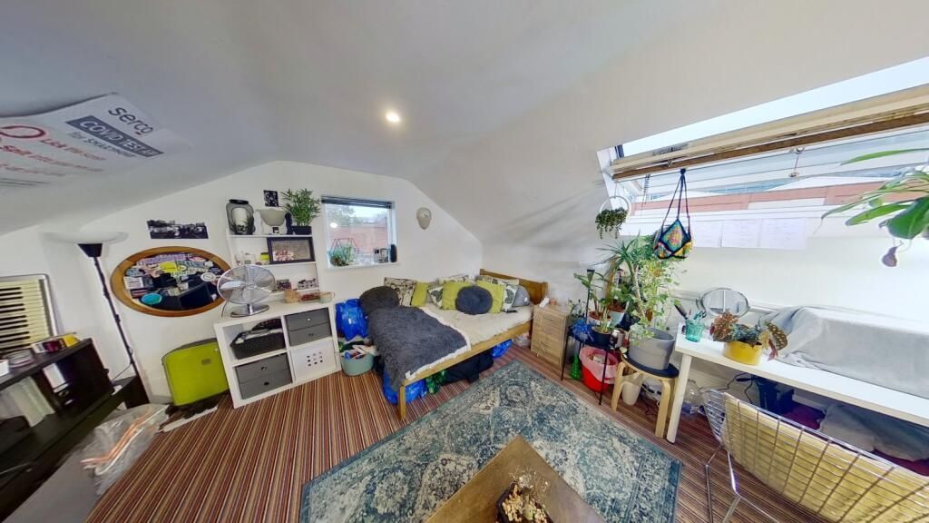 Property photo 2 of 15 Bright And Cozy Living Room With A Comfortable Sof...