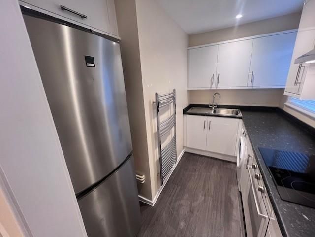 Property photo 3 of 8 Kitchen