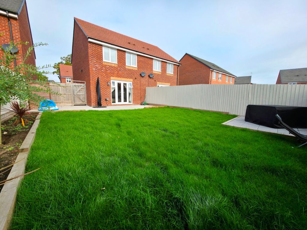 Property photo 2 of 12 Rear Aspect