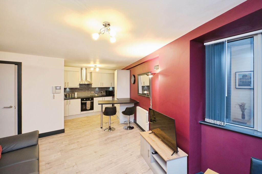 Property photo 3 of 13 Living Area