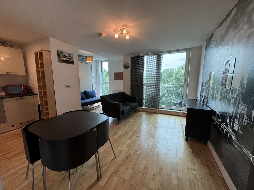 Property photo 1 of 7 Living Area