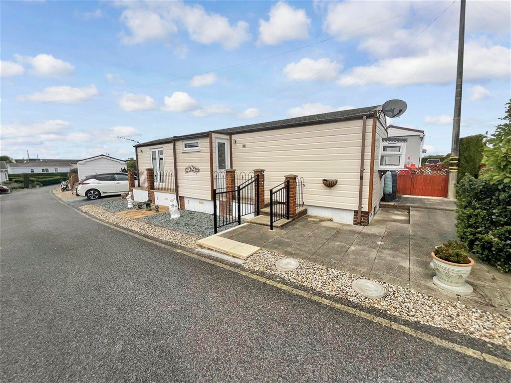 Property photo 3 of 8 Front