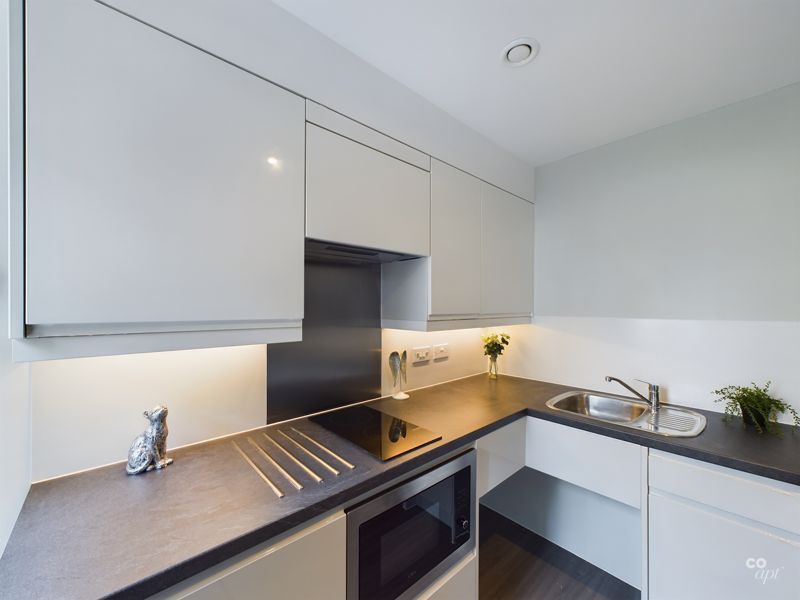 Property photo 2 of 8 Kitchen Area