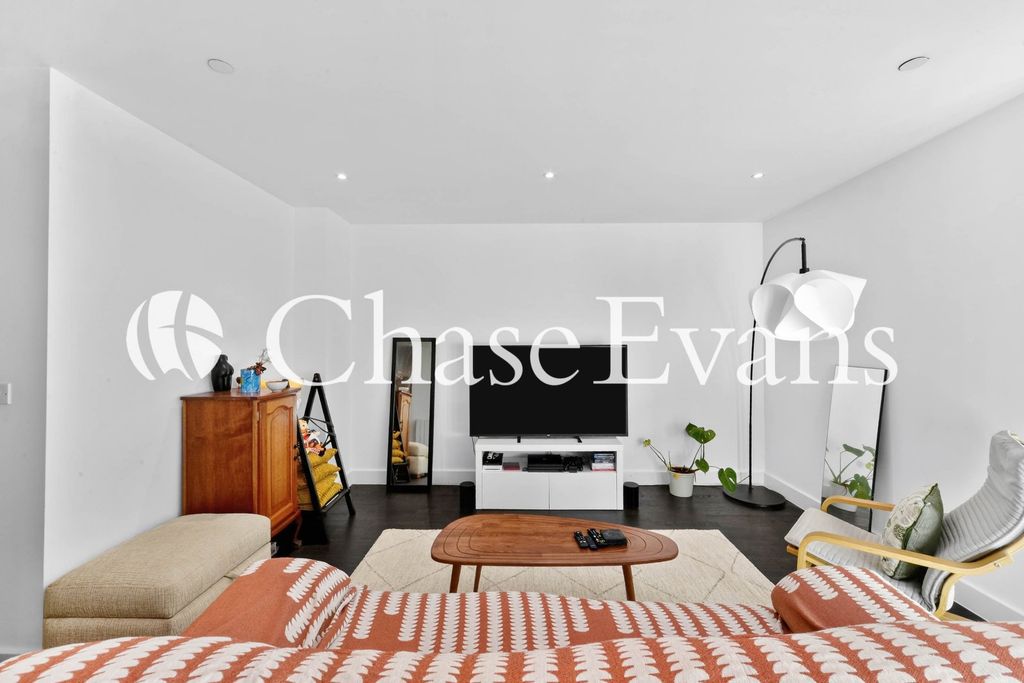 Property photo 3 of 18 Living Area