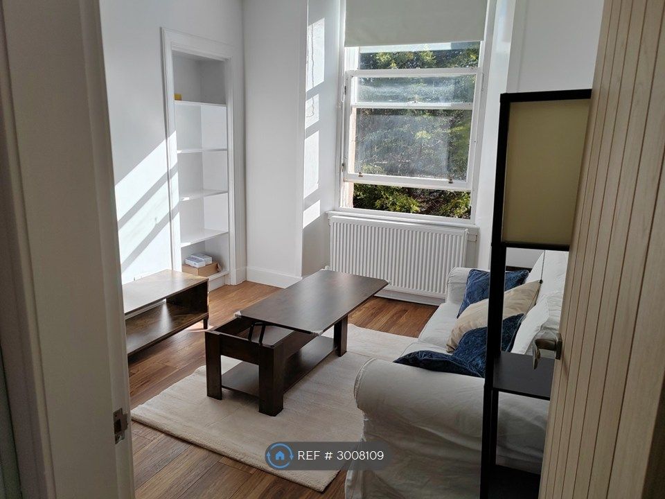 Property photo 1 of 19 Sunny Living Room