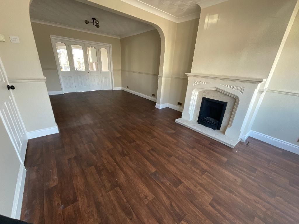 Property photo 3 of 17 Living Room 23'10 x 11'2