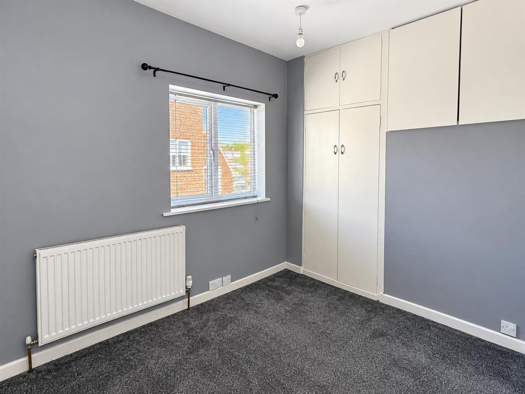 Property photo 3 of 18 Minimal Grey Bedroom With Built-In Storage.Png