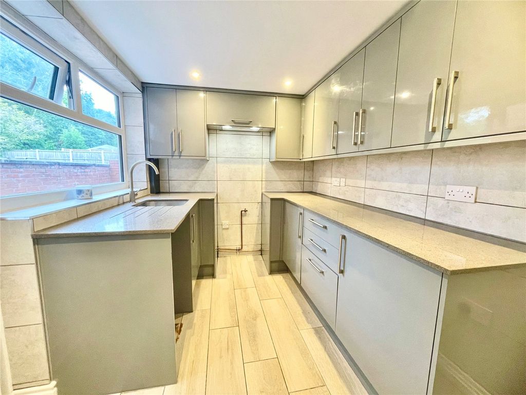 Property photo 3 of 12 Kitchen