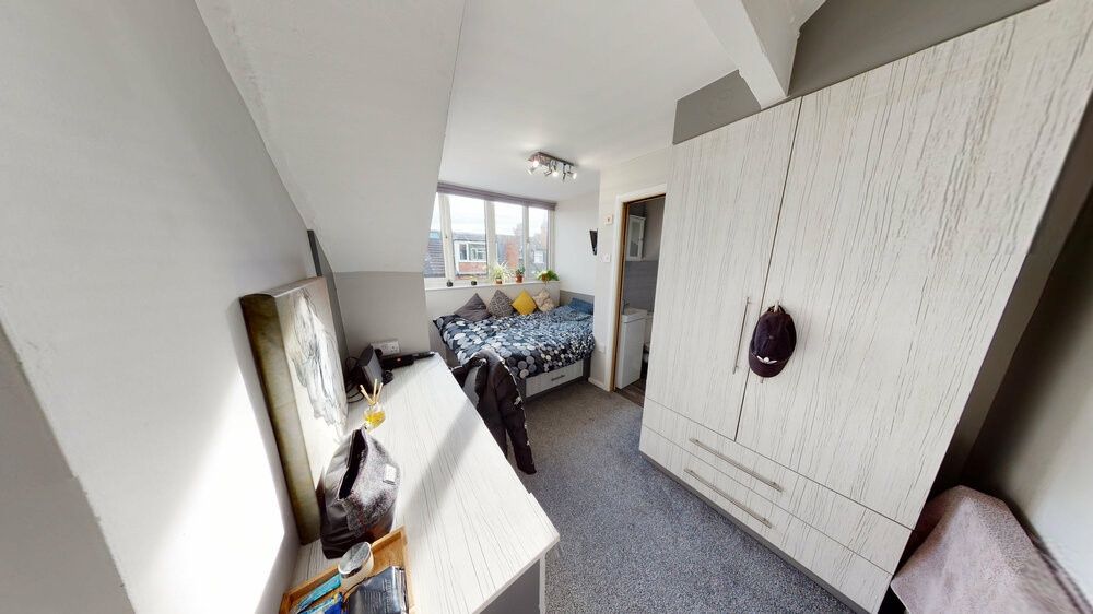 Property photo 1 of 20 A Spacious And Well-Lit Master Bedroom Featuring A...