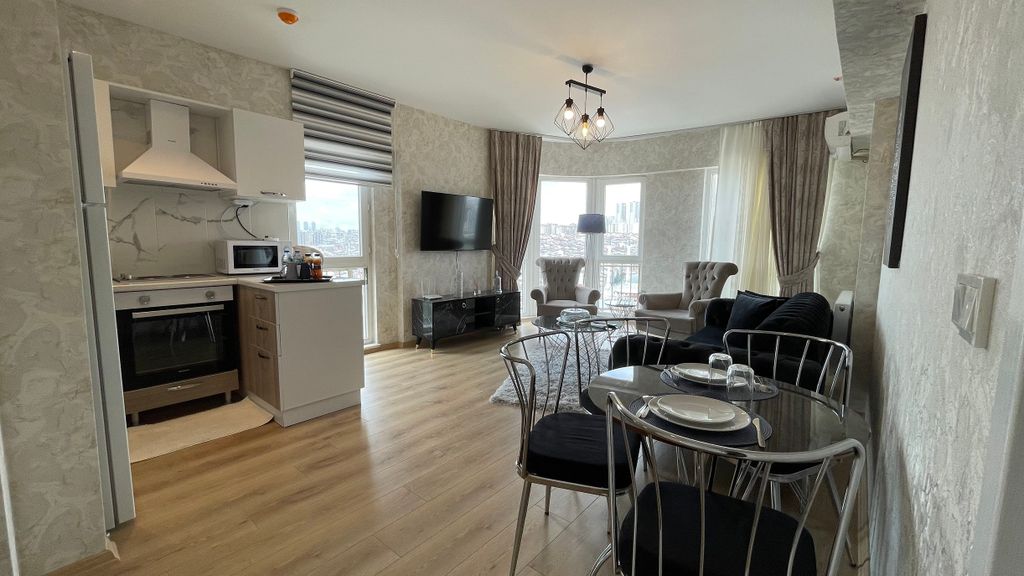 Property photo 3 of 10 Modern Istanbul Apartments For Sale With On-Complex Facilities - Modern Open-Plan Living Space