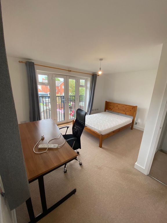 Property photo 1 of 11 Bright Double Bedroom With A Wooden Bed Frame, Lar...