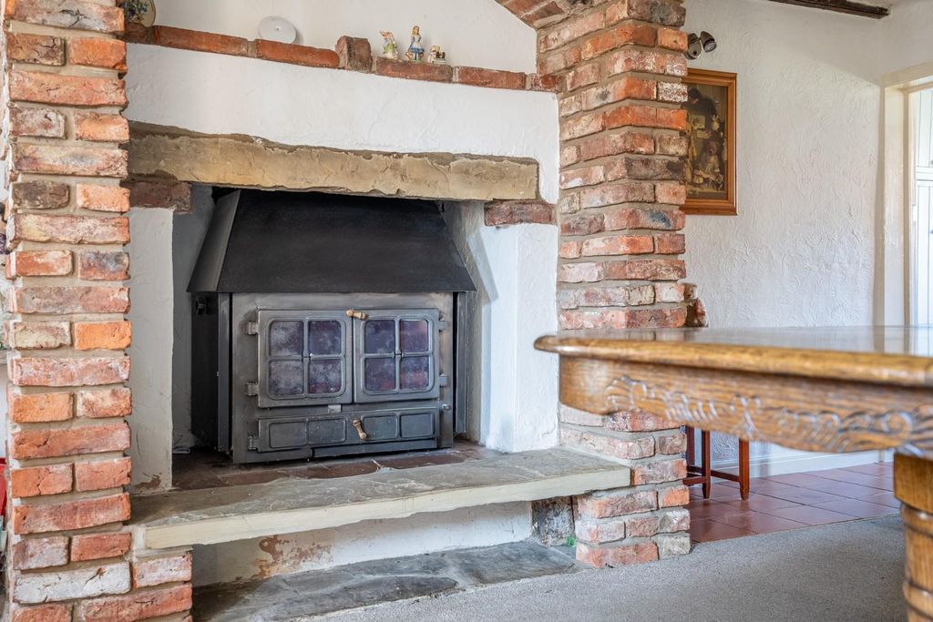 Property photo 3 of 18 Fireplace