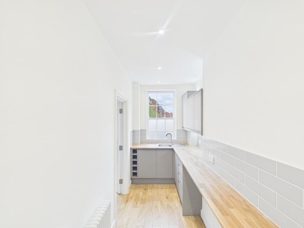 Property photo 3 of 12 Kitchen