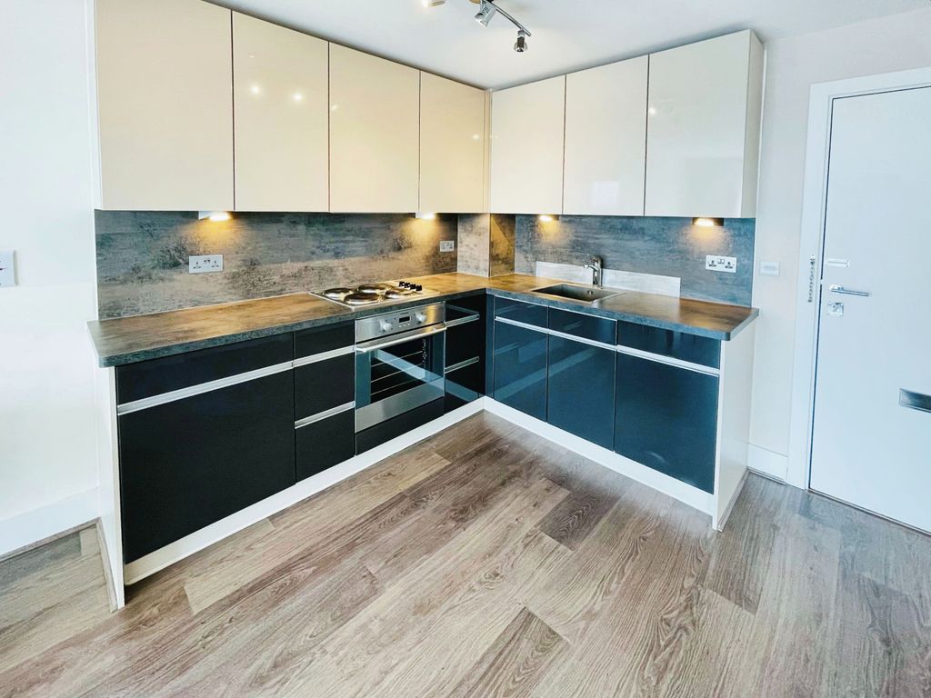 Property photo 3 of 7 Kitchen Area