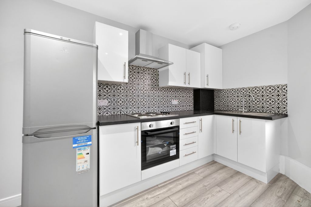 Property photo 3 of 12 Open-Plan Kitchen