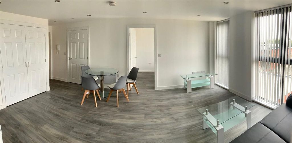 Property photo 1 of 11 Bright Open-Plan Lounge With Dining Area...