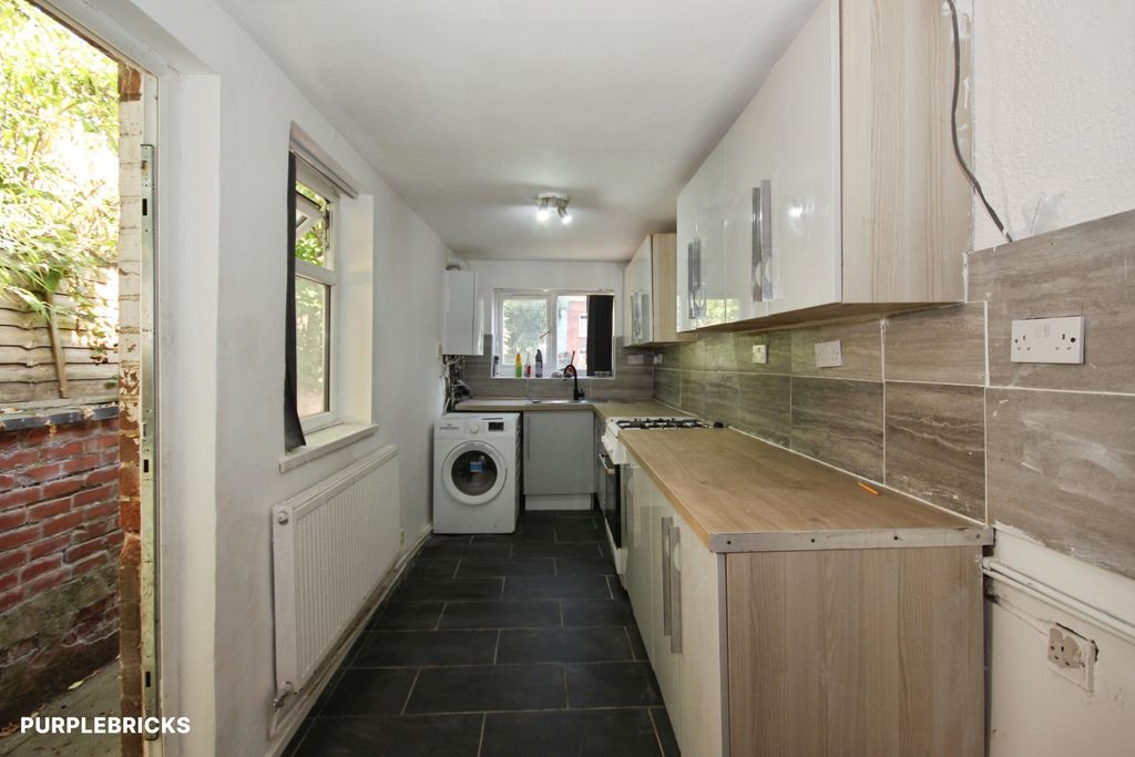 Property photo 3 of 13 Kitchen