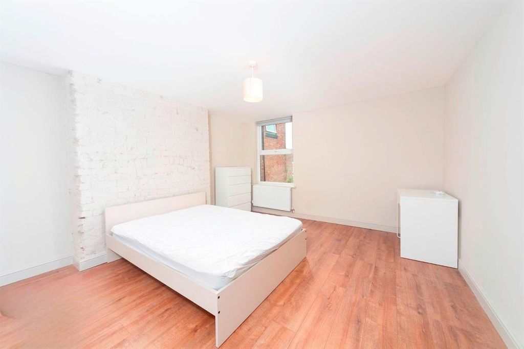 Property photo 3 of 9 Bright, Clean Bedroom With Wood Floors...