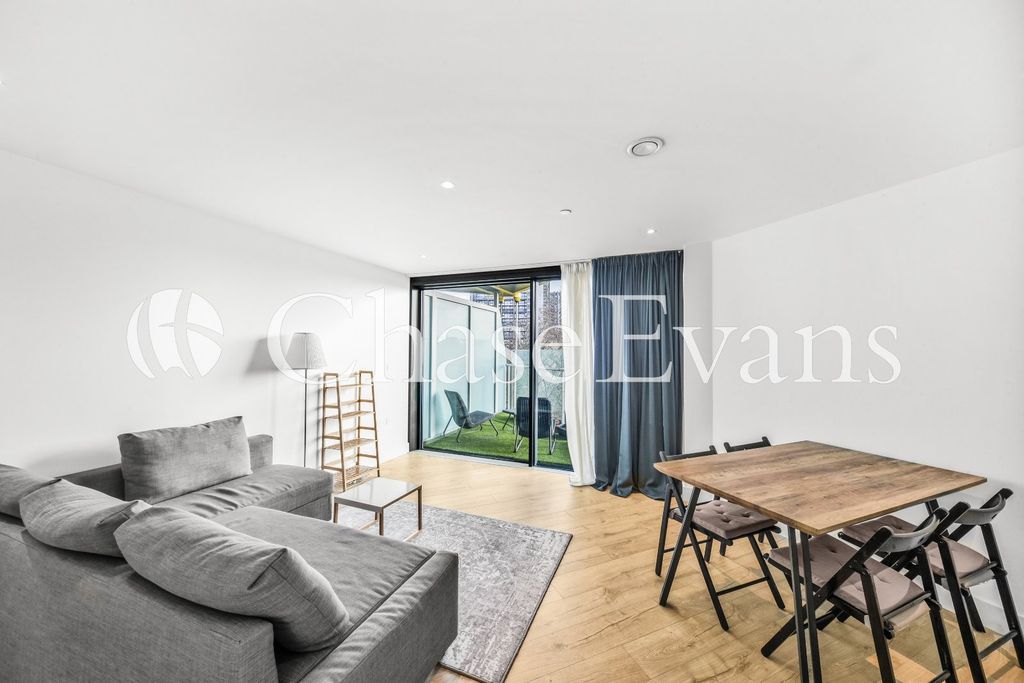 Property photo 1 of 11 Living Area