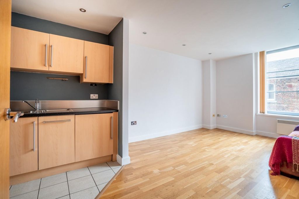 Property photo 1 of 12 Living Area