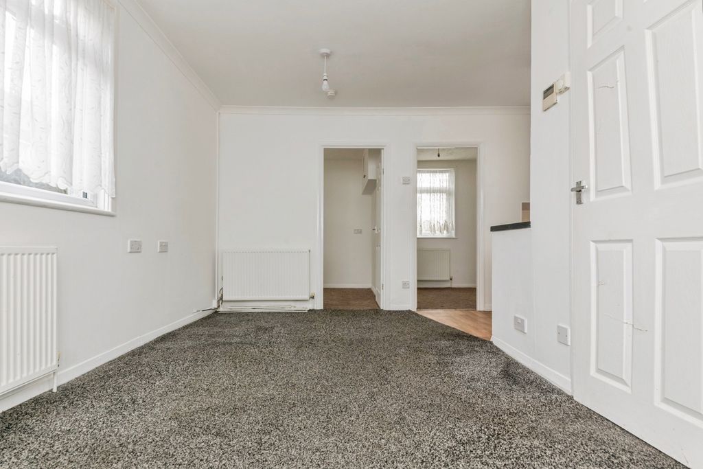 Property photo 2 of 9 Living Area