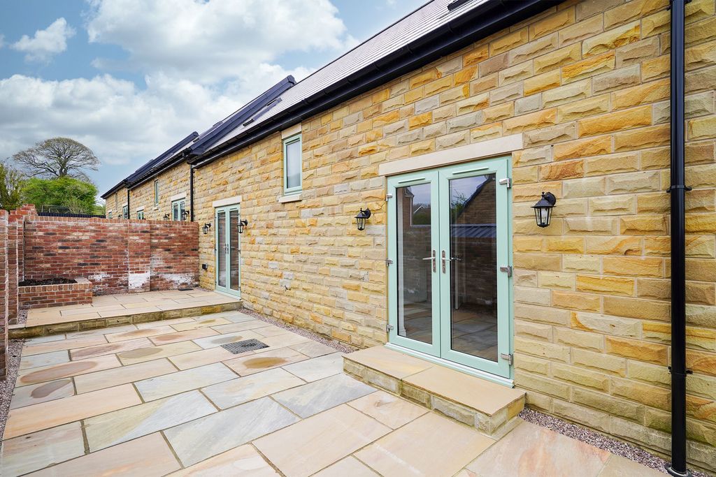 Property photo 2 of 11 Rear Patio Area