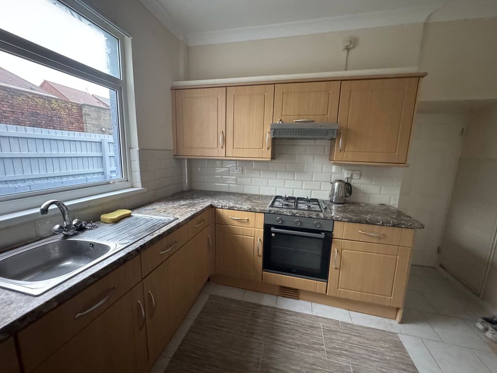 Property photo 3 of 12 Kitchen