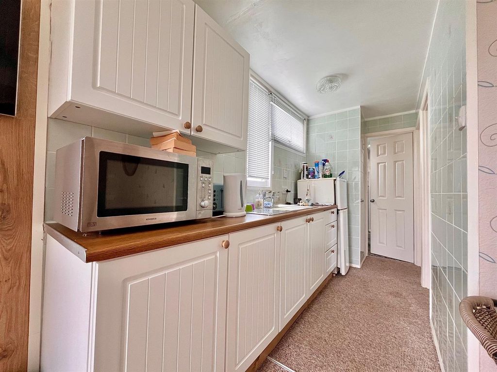 Property photo 3 of 8 Kitchen Area