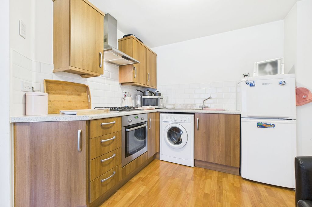 Property photo 3 of 11 Kitchen/Living Area