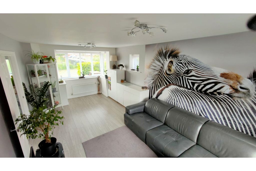Property photo 2 of 13 Living Area