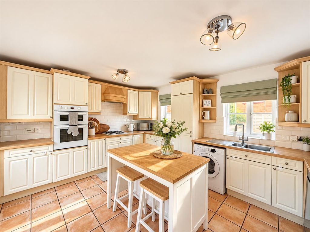 Property photo 3 of 21 Warm Modern Farmhouse Kitchen.Png