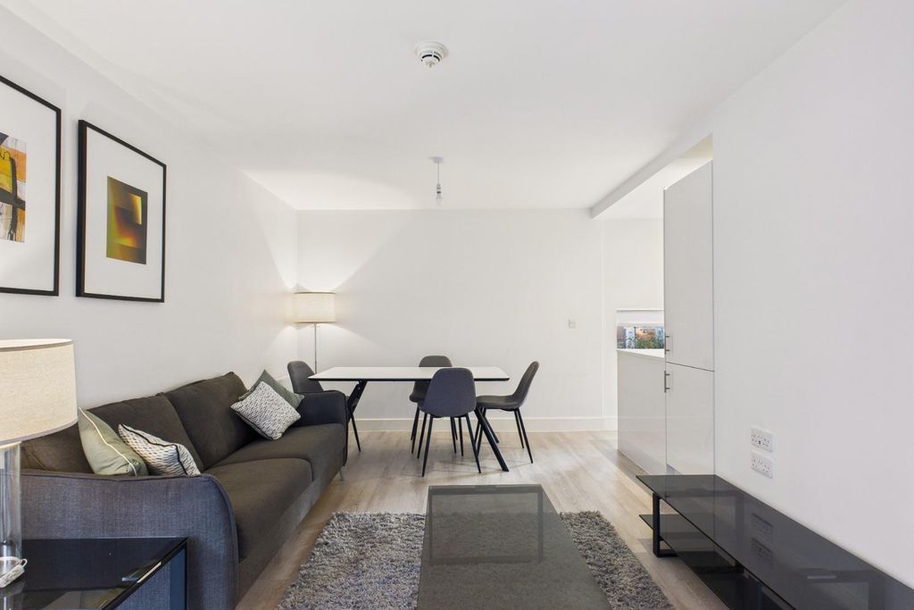Property photo 3 of 11 Living/Dining Area