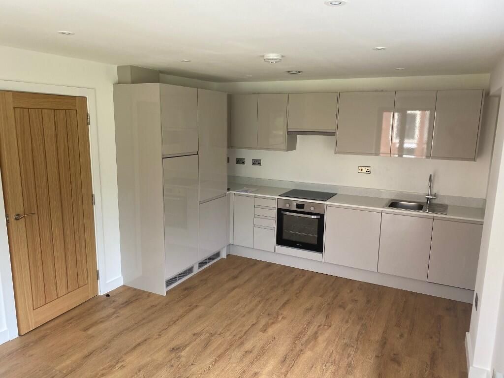 Property photo 3 of 8 Kitchen Area