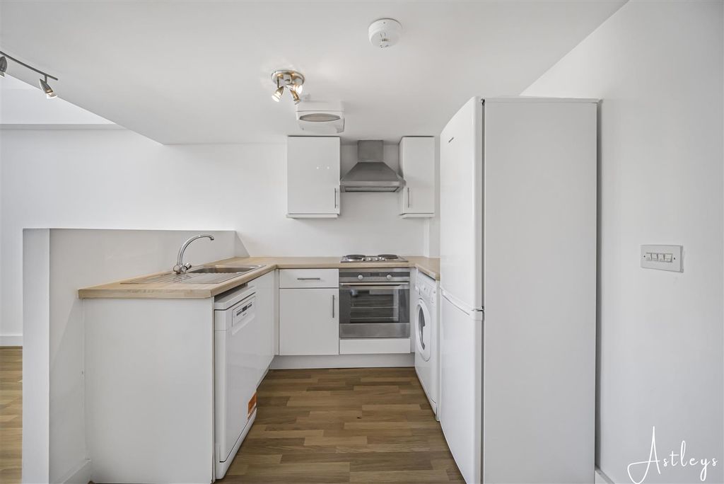 Property photo 2 of 16 Kitchen Area