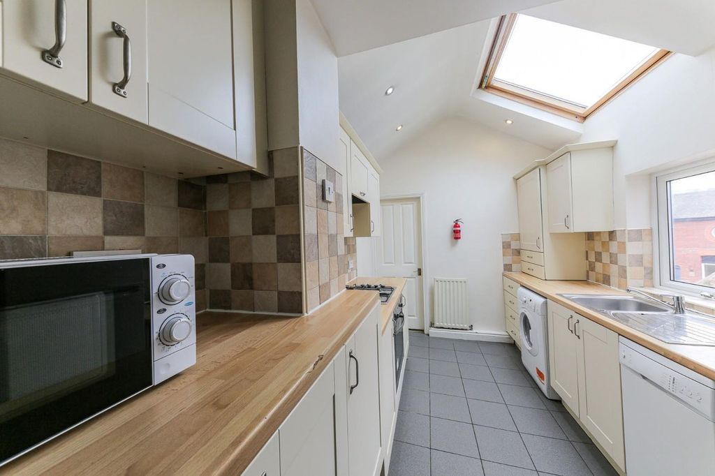 Property photo 3 of 13 Kitchen